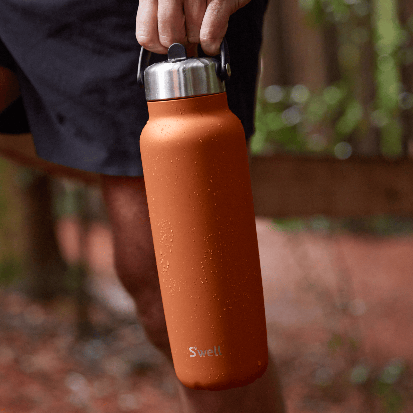explorer-with-flip-straw-lid-40oz-d5 Swell-Explorer-Water-Bottle-40oz-Orange-Carnelian-LifeStyle.png