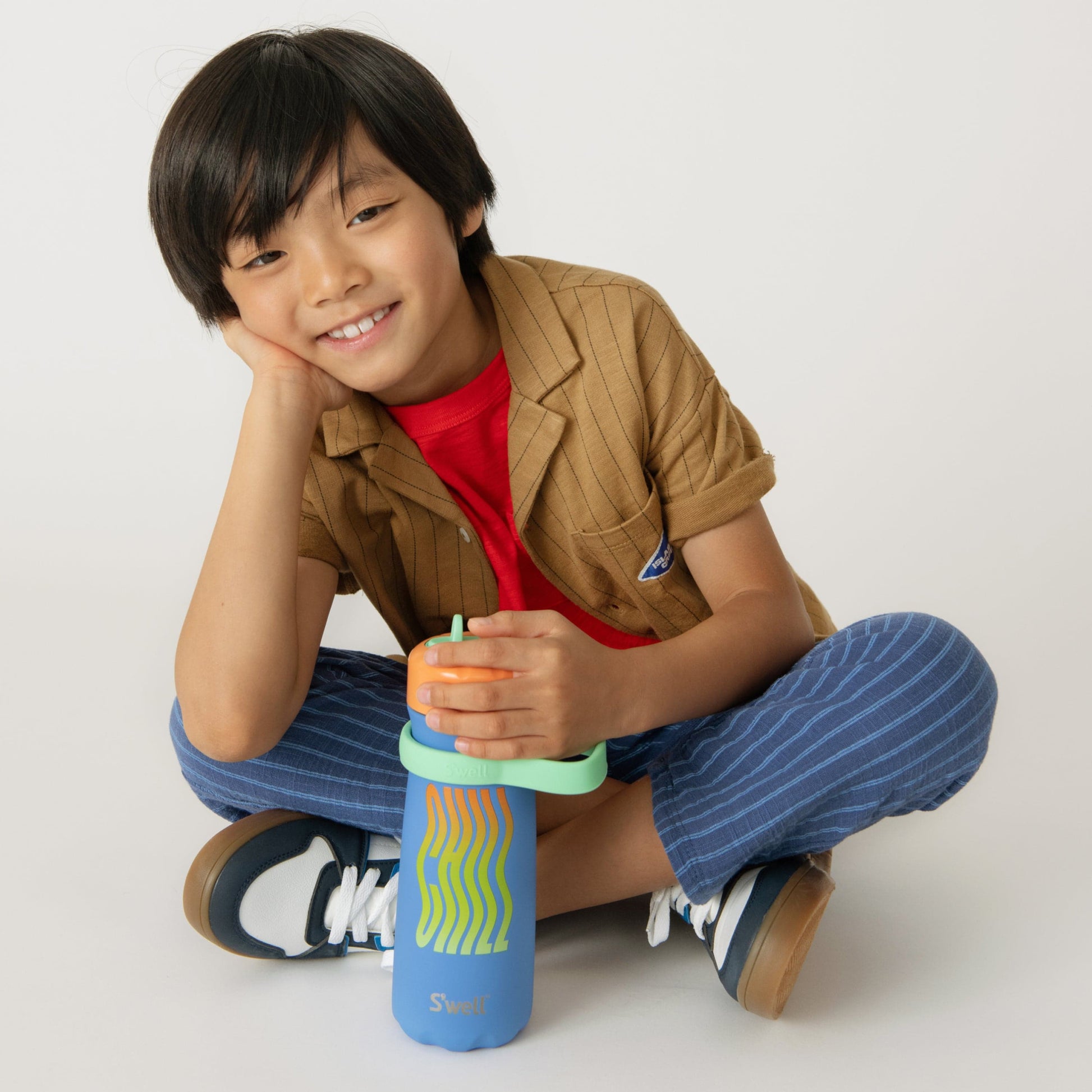 traveler-with-flip-straw-lid-16oz-r4 Swell-Kids-Water-Bottle-Traveler-16oz-Blue-Chill-Lifestyle.jpg